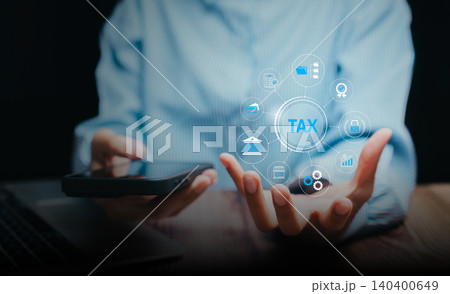 Financial concept. Business hand holding virtual tax icons, digital compliance process, financial planning strategy, e-filing support, accounting management efficiency. 140400649