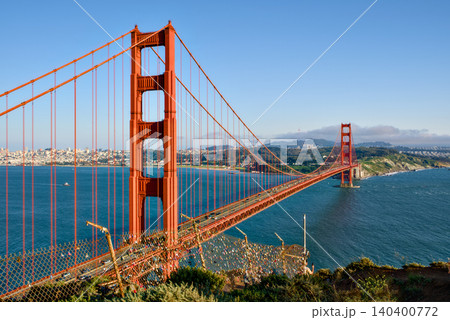 Golden Gate Bridge with city skyline and bay from Marin Headlands 140400772