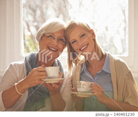 Portrait, smile and woman with senior mother drinking tea at breakfast in the morning, bonding and happy in house. Face, elderly mom and daughter with coffee cup, love and family at home together Portrait, smile and woman with senior mother drinking tea at breakfast in the morning, bonding and happy in house. Face, elderly mom and daughter with coffee cup, love and family at home together 140401230