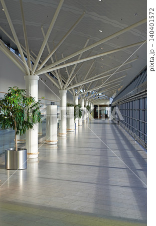 Empty, airport and building for travel, architecture and interior design with corridor or lobby background. Inside for international journey, opportunity and transportation at airline in Copenhagen Empty, airport and building for travel, architecture and interior design with corridor or lobby background. Inside for international journey, opportunity and transportation at airline in Copenhagen 140401572