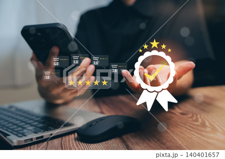 Person Holding Smartphone with Rating and Review Concept for Digital Marketing and Customer Feedback Evaluation 140401657