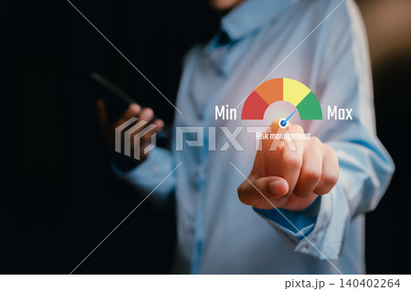 Finger Pointing at Risk Management Gauge in Business Environment, business concept 140402264