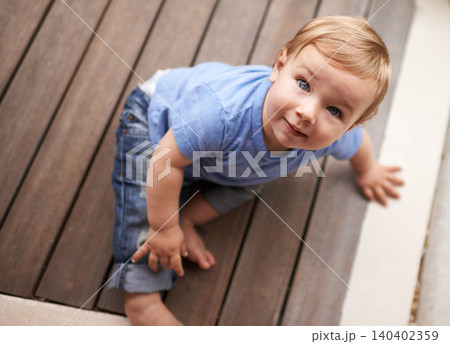 Floor, above or portrait of baby in home for fun playing, happiness or learning alone on porch. Relax, boy or face of a toddler on ground with smile for child development or growth in house top view Floor, above or portrait of baby in home for fun playing, happiness or learning alone on porch. Relax, boy or face of a toddler on ground with smile for child development or growth in house top view 140402359