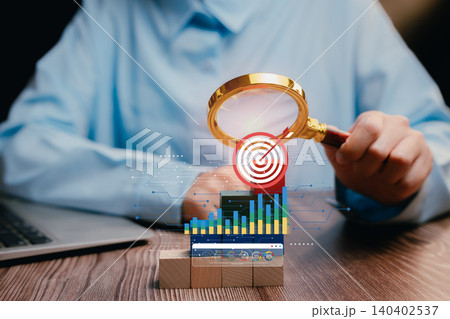 Success concept. Business Analysis with Magnifying Glass on Data Charts and Targets for Market Research and Investment Strategies Success concept. Business Analysis with Magnifying Glass on Data Charts and Targets for Market Research and Investment Strategies 140402537