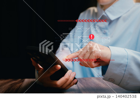 Email concept. Businessman Using Smartphone with Email Notifications on Screen in a Dark Setting Email concept. Businessman Using Smartphone with Email Notifications on Screen in a Dark Setting 140402538