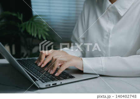 Person typing on laptop with minimalist style, Business concept Person typing on laptop with minimalist style, Business concept 140402748