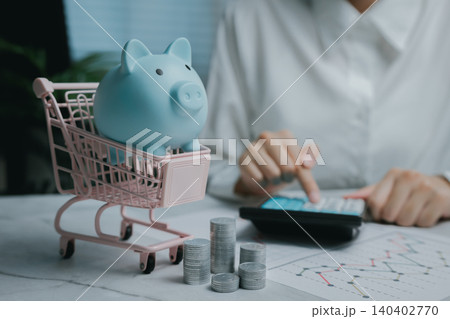 Savings concepts with piggy bank and financial tools, Business concept 140402770