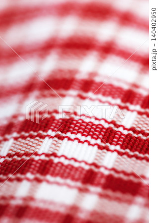Checkered, cloth and closeup on textile with pattern, color or cotton fabric of picnic blanket. Plaid, tablecloth and lines in motif or traditional style, aesthetic or material with woven detail 140402950