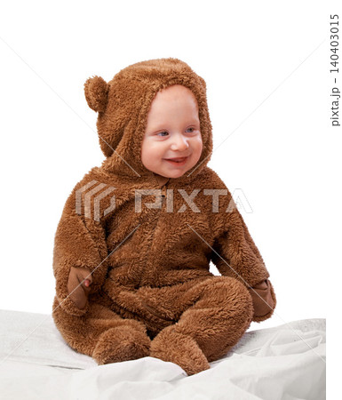 Studio, baby and onesie with costume, bear and toddler with joy and fun. Child, newborn and happiness with adorable, comfort and dressed up infant for development isolated on white background Studio, baby and onesie with costume, bear and toddler with joy and fun. Child, newborn and happiness with adorable, comfort and dressed up infant for development isolated on white background 140403015
