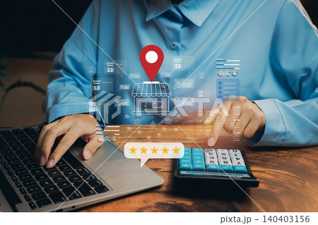 Person Using Laptop with Calculator and Digital Marketing Elements for Business Analysis and Location Services, Business concept Person Using Laptop with Calculator and Digital Marketing Elements for Business Analysis and Location Services, Business concept 140403156
