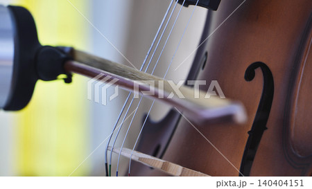 Robotic arm playing classical cello music at technology art exhibition Robotic arm playing classical cello music at technology art exhibition 140404151