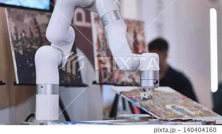Robot arm painting art on canvas at technology exhibition, artificial intelligence 140404160