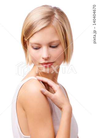 Beauty, makeup and hair with shoulder of woman in studio isolated on white background for self care. Face, skincare and aesthetic with young person at wellness salon for cosmetics or dermatology Beauty, makeup and hair with shoulder of woman in studio isolated on white background for self care. Face, skincare and aesthetic with young person at wellness salon for cosmetics or dermatology 140404670