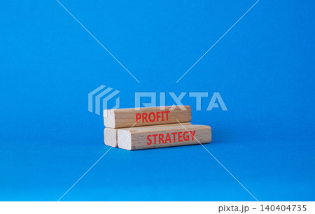 Profit strategy symbol. Concept word Profit strategy on wooden blocks. Beautiful blue background. Business and Profit strategy concept. Copy space Profit strategy symbol. Concept word Profit strategy on wooden blocks. Beautiful blue background. Business and Profit strategy concept. Copy space 140404735