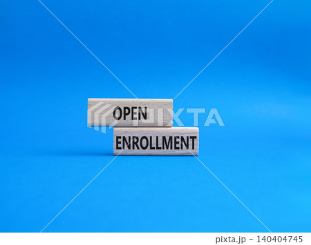 Open Enrollment symbol. Wooden blocks with words Open Enrollment. Beautiful blue background. Business and Open Enrollment concept. Copy space. Open Enrollment symbol. Wooden blocks with words Open Enrollment. Beautiful blue background. Business and Open Enrollment concept. Copy space. 140404745