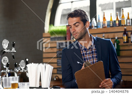 Bar, stock or man with checklist for small business logistics, inventory or menu update on clipboard. Startup, reading pub info or manager writing sale price for an order in diner cafe or restaurant 140404876
