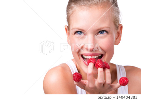 Healthy, playful and woman eating raspberries, fingers and wellness isolated on white studio background. Person, mockup space or model with fruit and funny with nutrition, fresh or happiness with joy Healthy, playful and woman eating raspberries, fingers and wellness isolated on white studio background. Person, mockup space or model with fruit and funny with nutrition, fresh or happiness with joy 140404883