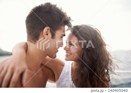 Couple, embrace and smile with lake, water and nature for love and summer travel. Man, woman and holiday with adventure, happiness and intimate relationship with date or honeymoon for ocean journey Couple, embrace and smile with lake, water and nature for love and summer travel. Man, woman and holiday with adventure, happiness and intimate relationship with date or honeymoon for ocean journey 140405040