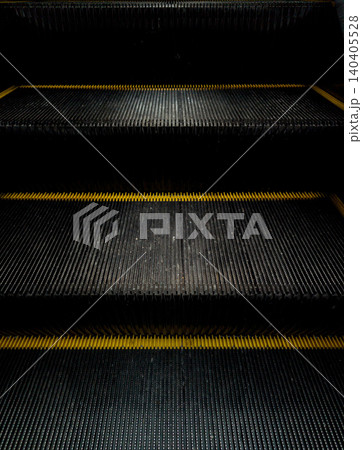 Abstract dark geometric line pattern of escalator steps. 140405528