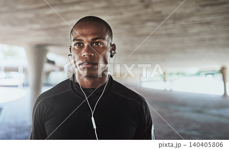 Man, face and earphones for fitness outdoor with thinking, listening to podcast and exercise for healthy body. Athlete, african person and music with audio, radio and sound for workout and training Man, face and earphones for fitness outdoor with thinking, listening to podcast and exercise for healthy body. Athlete, african person and music with audio, radio and sound for workout and training 140405806