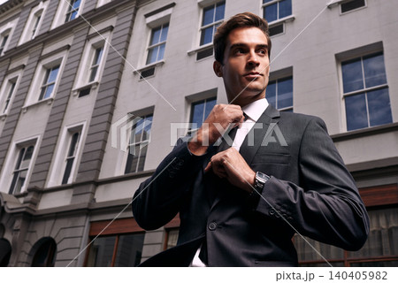 Businessman, city and thinking for travel to meeting, job or interview with buildings outdoors. Suit, professional person and fixing tie with confidence for idea, vision and planning in Australia 140405982