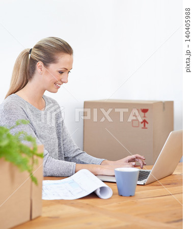 Employee, moving and woman with a laptop, boxes and smile with online reading and startup. Person, consultant or entrepreneur with computer or office with lady or idea with architecture or renovation Employee, moving and woman with a laptop, boxes and smile with online reading and startup. Person, consultant or entrepreneur with computer or office with lady or idea with architecture or renovation 140405988