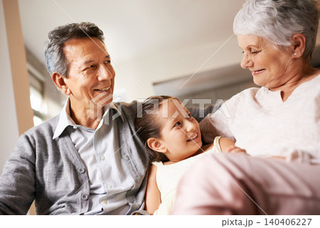 Home, smile and grandparents with grandchild in living room, together and love with happiness. Old people, grandmother and grandpa in house as seniors in retirement, elderly and bonding with girl Home, smile and grandparents with grandchild in living room, together and love with happiness. Old people, grandmother and grandpa in house as seniors in retirement, elderly and bonding with girl 140406227