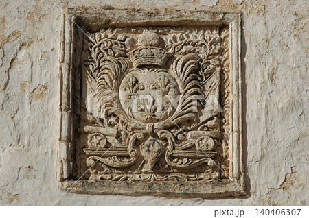 Carved Stone Coat of Arms with Fleurs-de-lis on Historic Wall in Chora Kythira Greece Carved Stone Coat of Arms with Fleurs-de-lis on Historic Wall in Chora Kythira Greece 140406307