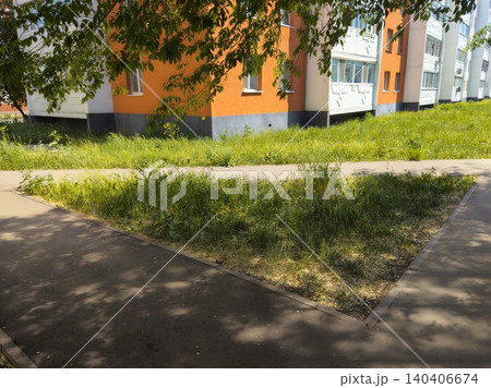 Urban green space with modern residential building in springtime Urban green space with modern residential building in springtime 140406674