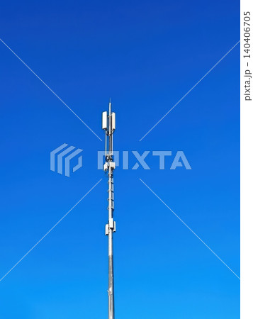 Modern telecommunications tower against clear blue sky for wireless connectivity Modern telecommunications tower against clear blue sky for wireless connectivity 140406705