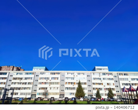 Modern urban apartment building with blue sky background Modern urban apartment building with blue sky background 140406712