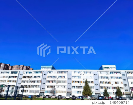 Urban residential building against clear blue sky on sunny day Urban residential building against clear blue sky on sunny day 140406714