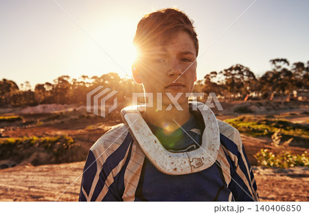 Man, motocross rider or portrait for extreme sport in nature, confident or skill in driving with speed. Man, pride face or gear for motorcycle or off road action or danger with fast vehicle in wood Man, motocross rider or portrait for extreme sport in nature, confident or skill in driving with speed. Man, pride face or gear for motorcycle or off road action or danger with fast vehicle in wood 140406850
