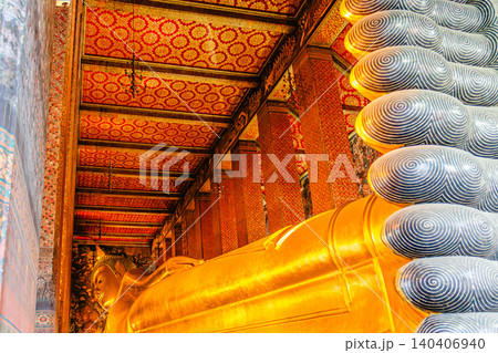 The Big golden Reclining Buddha within Wat Pho is the important in Bangkok, Thailand The Big golden Reclining Buddha within Wat Pho is the important in Bangkok, Thailand 140406940