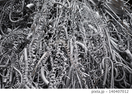 Metal shaving, wire and abstract of material with scrap, manufacturing and industry maintenance. Design, aluminium and waste with texture for production, construction and recycling for environment Metal shaving, wire and abstract of material with scrap, manufacturing and industry maintenance. Design, aluminium and waste with texture for production, construction and recycling for environment 140407012