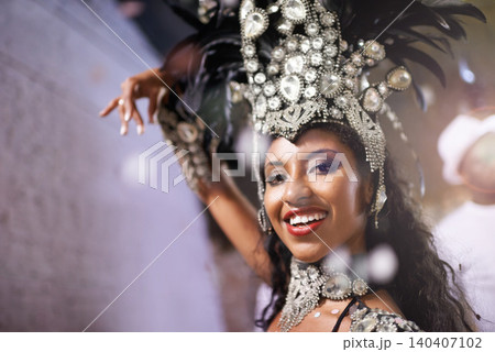 Carnival, dancer and portrait of woman at festival, event or samba in Brazil for summer celebration of culture. Salsa, dancer and creative fashion with happiness from music or people at club or party Carnival, dancer and portrait of woman at festival, event or samba in Brazil for summer celebration of culture. Salsa, dancer and creative fashion with happiness from music or people at club or party 140407102