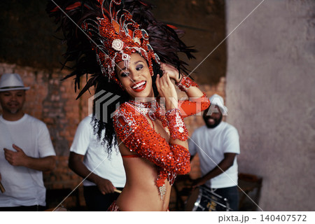 Dancer, samba and woman at carnival in celebration, music culture and happy band in Brazil. Dance, party and girl in costume with smile at festival, parade or stage performance in Rio de Janeiro. Dancer, samba and woman at carnival in celebration, music culture and happy band in Brazil. Dance, party and girl in costume with smile at festival, parade or stage performance in Rio de Janeiro. 140407572