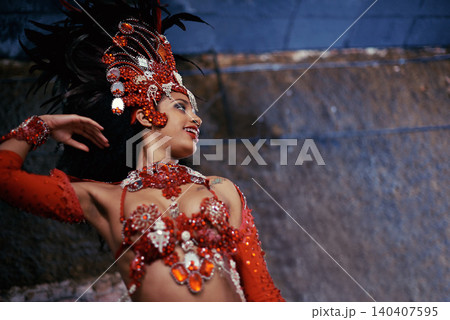 Samba, carnival or happy woman in costume for event, music culture or night celebration in Brazil. Outdoor, performance or proud dancer with smile at festival party, parade or show in Rio de Janeiro Samba, carnival or happy woman in costume for event, music culture or night celebration in Brazil. Outdoor, performance or proud dancer with smile at festival party, parade or show in Rio de Janeiro 140407595