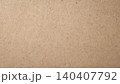 Close-up of natural brown kraft paper texture with subtle fiber details 140407792
