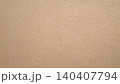 Close-up of natural brown kraft paper texture with subtle fiber details 140407794