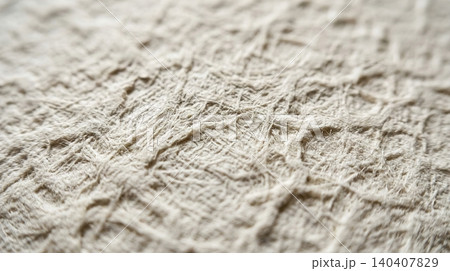 Extreme close-up of natural linen fabric texture with raw fiber detail 140407829