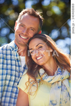 Portrait, love and couple with smile in park for summer romance, trees and fun outdoor date. Relax, mature man and happy woman in garden with morning sunshine, hug and marriage bonding in nature. Portrait, love and couple with smile in park for summer romance, trees and fun outdoor date. Relax, mature man and happy woman in garden with morning sunshine, hug and marriage bonding in nature. 140408069