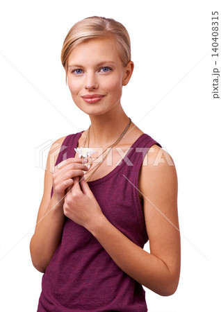 Studio, model and portrait with daisy by white background and happy for blossom of spring season. Woman, face and positive for flower plant for botanical wellness and symbol of new beginning or love 140408315