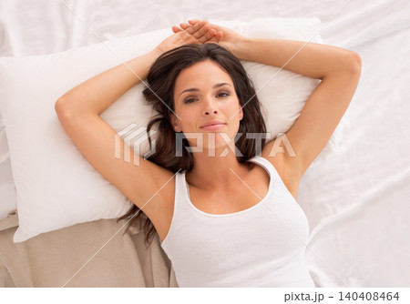 Morning, relax or portrait of woman in bedroom for resting in pyjamas to wake up alone in home. House, peace or above of female person on break or pillow with top view, ready to start day or chill Morning, relax or portrait of woman in bedroom for resting in pyjamas to wake up alone in home. House, peace or above of female person on break or pillow with top view, ready to start day or chill 140408464