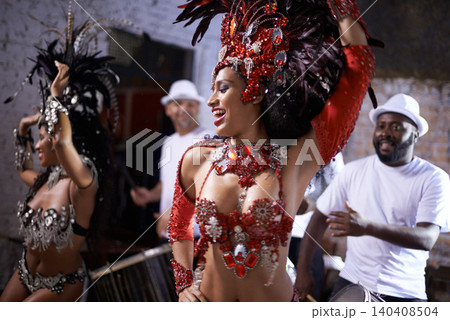 Happy woman, samba and dance at music festival, carnival or night performance with costume and band. Excited dancer, group and drummer for event, celebration and culture or history in Rio de Janeiro Happy woman, samba and dance at music festival, carnival or night performance with costume and band. Excited dancer, group and drummer for event, celebration and culture or history in Rio de Janeiro 140408504