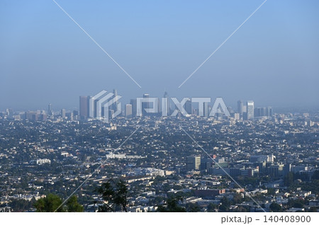 Los Angeles skyline view with downtown skyscrapers covered in morning smog. Los Angeles skyline view with downtown skyscrapers covered in morning smog. 140408900