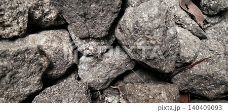 A pile of coarse gravel with clear texture details. 140409093