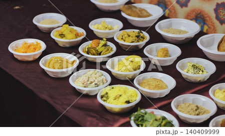 Indian food dishes serving as Prasad offering during cultural festival celebration Indian food dishes serving as Prasad offering during cultural festival celebration 140409999