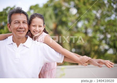 Outdoor, portrait and man with granddaughter, smile and piggyback in summer with grandchild and love. Mature person, happy and nature for playing with little girl, aeroplane and joy for senior Outdoor, portrait and man with granddaughter, smile and piggyback in summer with grandchild and love. Mature person, happy and nature for playing with little girl, aeroplane and joy for senior 140410020