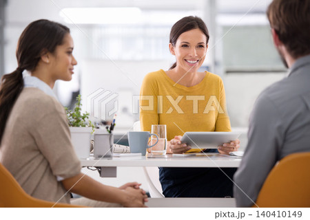 Happy, business woman and interview with tablet for meeting, recruiting or hiring at office desk. Female person, recruiter or employee in team discussion with technology for opportunity at workplace Happy, business woman and interview with tablet for meeting, recruiting or hiring at office desk. Female person, recruiter or employee in team discussion with technology for opportunity at workplace 140410149